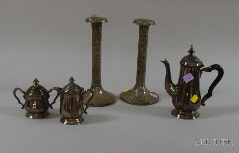 Appraisal: Pair of Repousse Tall Candlesticks and a Silver Plated Demitasse