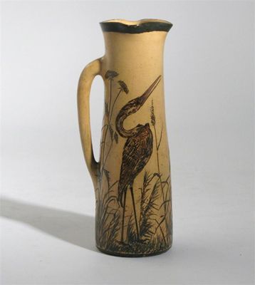 Appraisal: A Martin Brothers stoneware jug incised and painted with grotesque