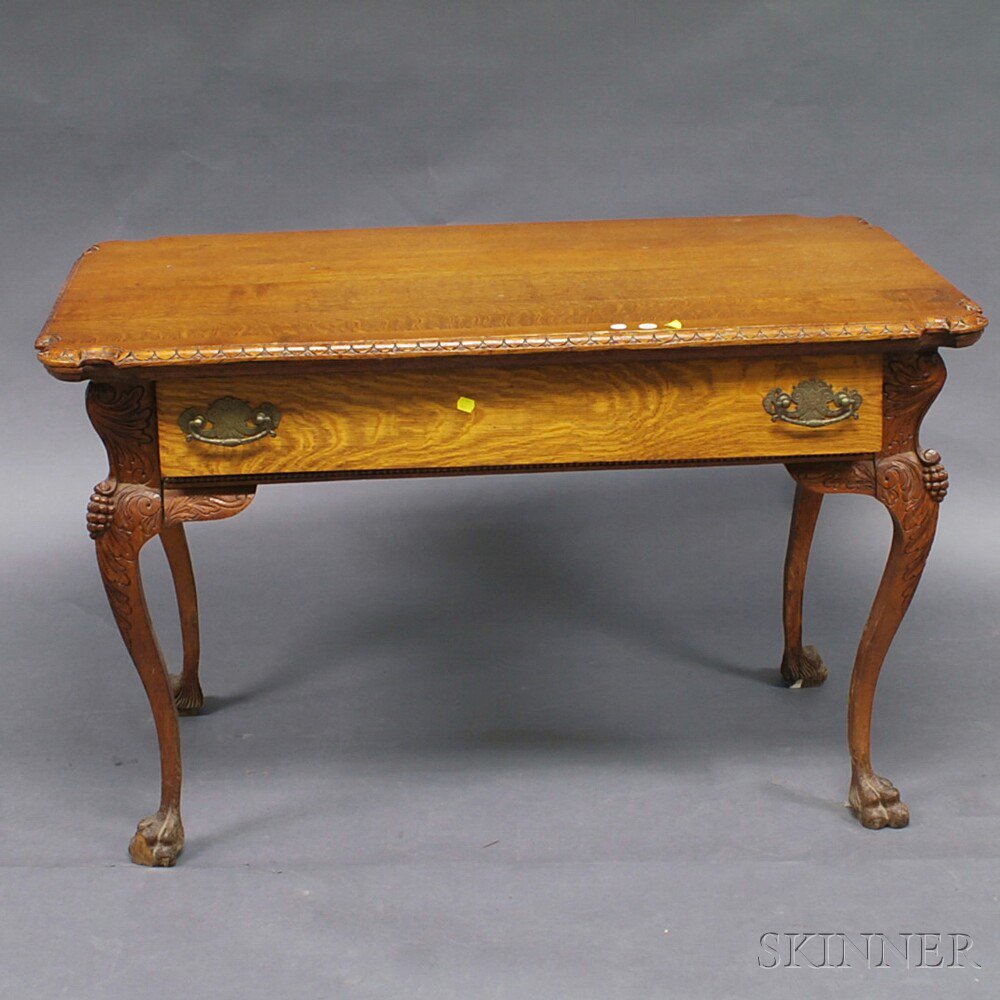 Appraisal: Carved Oak One-drawer Table th century the shaped top with