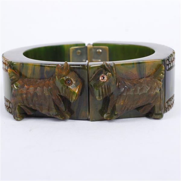 Appraisal: Bakelite Clamper Bangle Bracelet with pair carved Scottie Dog figures