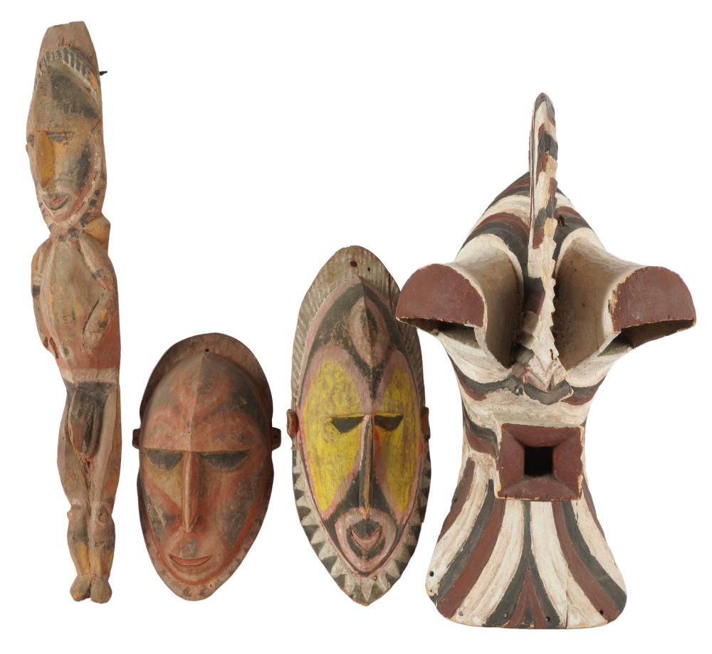 Appraisal: FOUR AFRICAN PAINTED WOOD CARVINGSunsigned comprising three masks the first