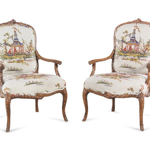 Appraisal: A Pair of Louis XV Style Faux Bois-Carved Fauteuils th