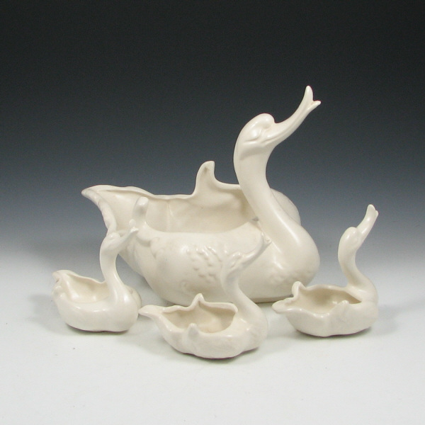 Appraisal: Hull Novelty Swans Lot of four swans including three small