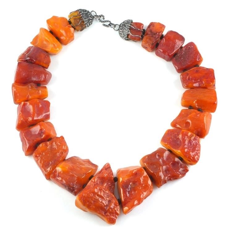 Appraisal: VINTAGE NATURAL RAW AMBER NECKLACERough amber stone necklace approximately inches