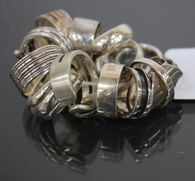 Appraisal: A GROUP OF SILVER RINGS and further various rings