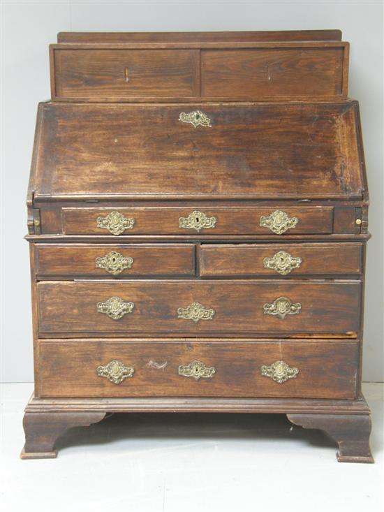 Appraisal: A th century oak bureau the interior with drawers central