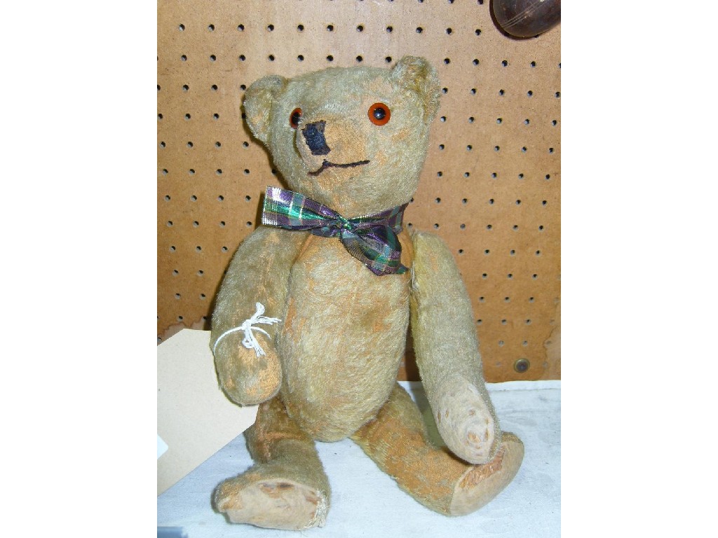 Appraisal: A small mid th century yellow plush teddy bear with