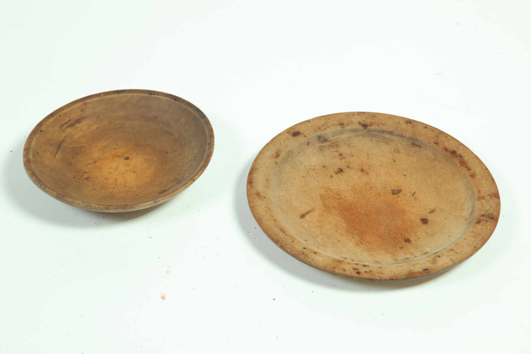 Appraisal: TWO TREENWARE PLATES American th century d