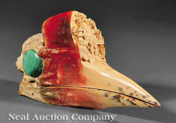 Appraisal: A Chinese Malachite Inset Hornbill Casque deeply carved to the