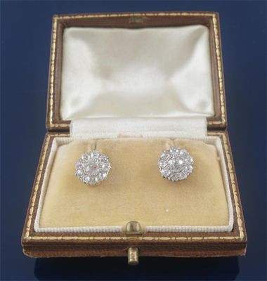 Appraisal: A pair of diamond cluster ear studs the circular diamonds