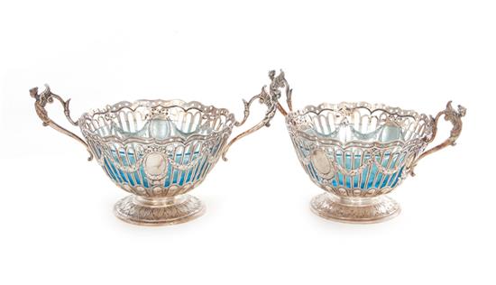 Appraisal: Pair Continental silver baskets late th century garland and pierced