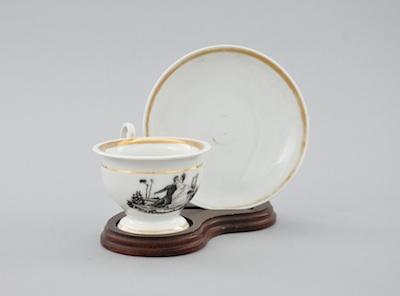 Appraisal: A Tucker Porcelain Cup and Saucer The deep saucer approx