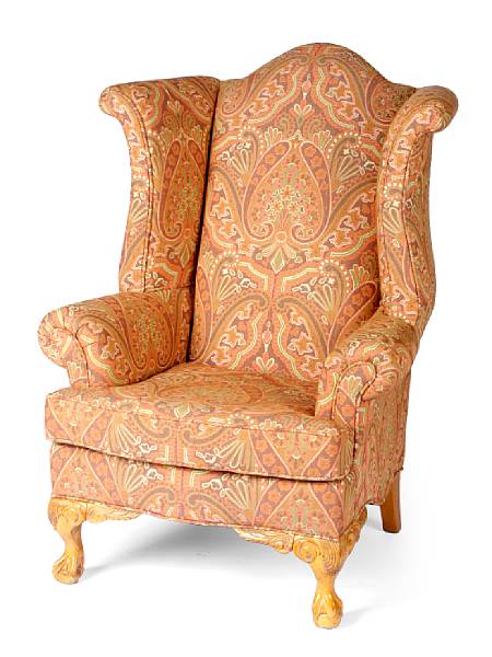 Appraisal: An American upholstered wing back chair height ft in width