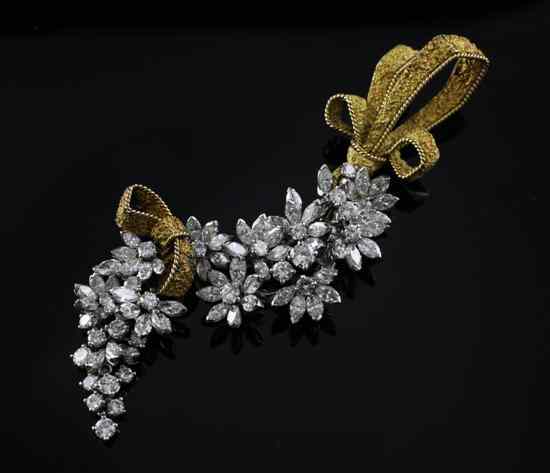 Appraisal: A French frosted gold platinum and diamond tremblant brooch of