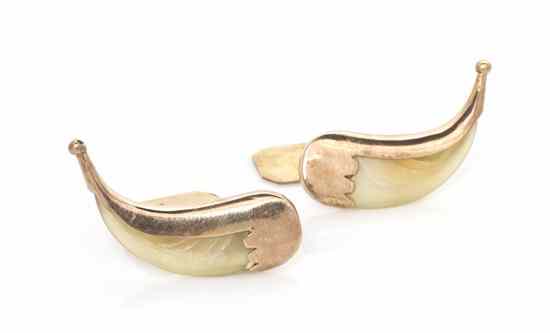 Appraisal: A Pair of Antique Yellow Gold and Tiger's Claw Cufflinks