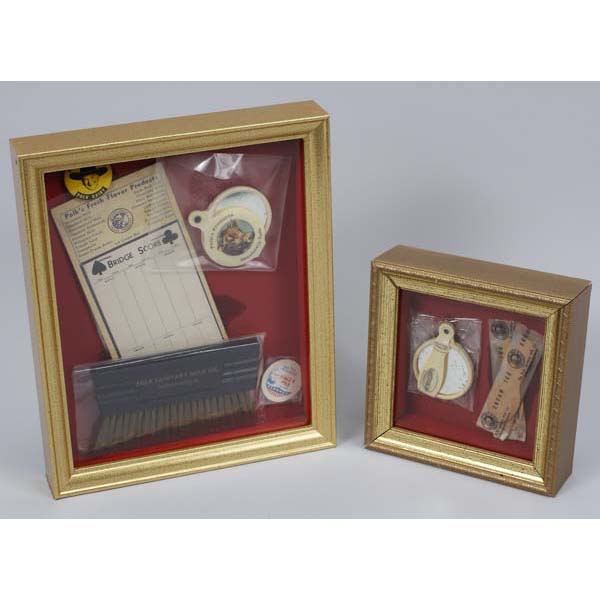 Appraisal: Polk's Milk Memorabilia and Advertising Collection Display Two shadowbox frames