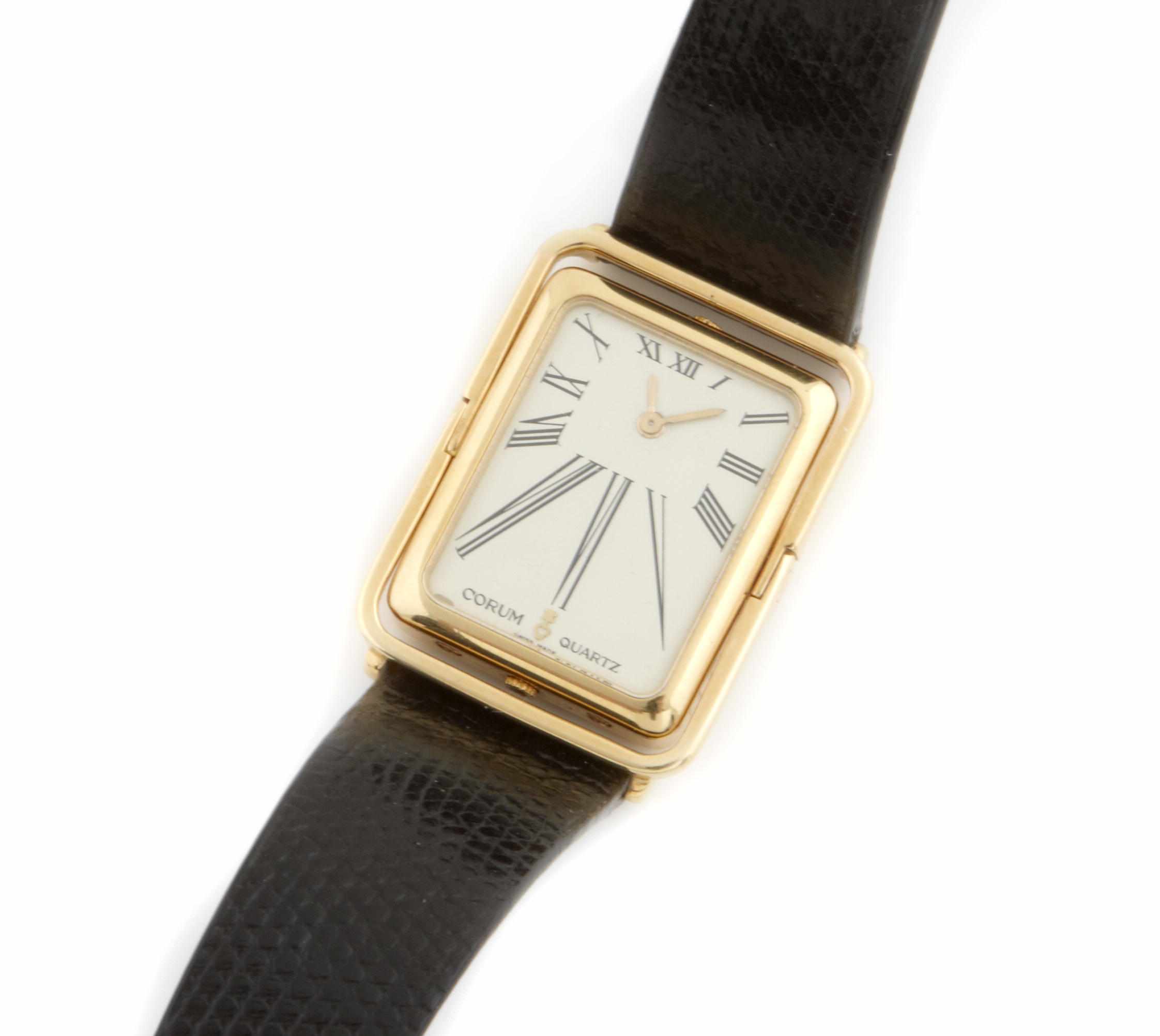 Appraisal: An k quartz reversible rectangular case wristwatch Corum case on