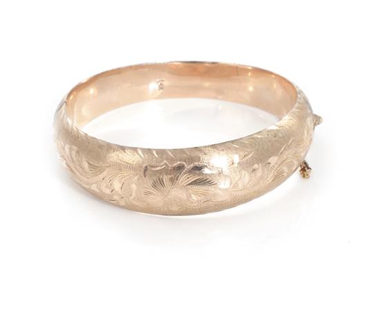 Appraisal: Vintage gold bangle K decorated tapered hinged design Dia and