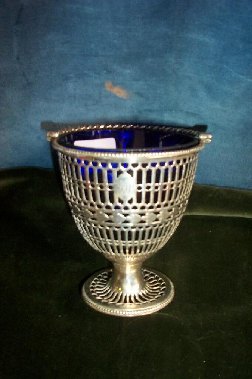 Appraisal: A Georgian silver basket with profuse pierced borders and rope