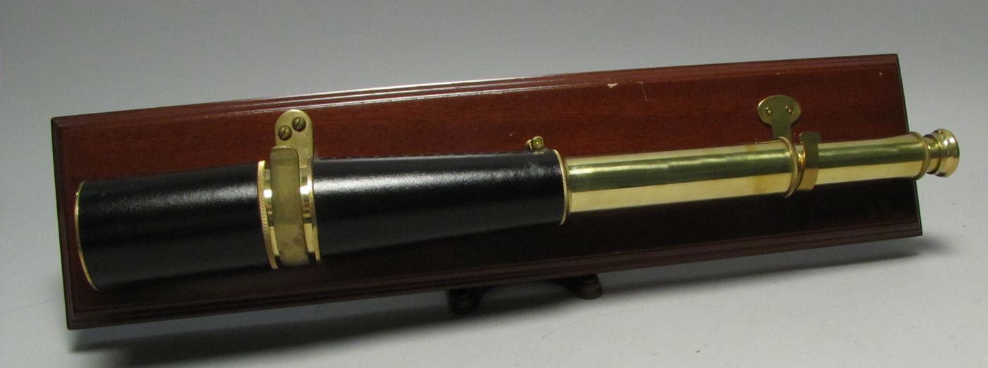 Appraisal: MOUNTED BRASS AND LEATHER THREE-DRAW SPYGLASS With leather-covered barrel and