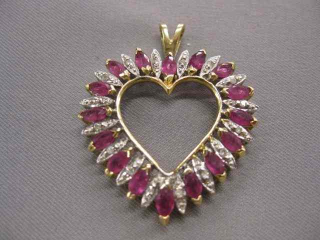 Appraisal: Ruby Diamond Heart Pendant cart of marquise rubies round diamonds