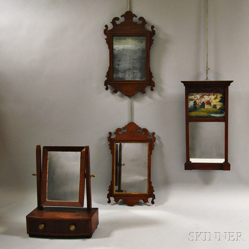 Appraisal: Four Mirrors two small Chippendale mahogany scroll-frame mirrors a small