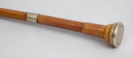 Appraisal: SILVER-MOUNTED FRUITWOOD CANE The silver Birmingham with husk band on