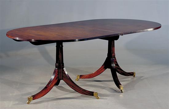 Appraisal: Regency style double-pedestal mahogany dining table rectangular top with D-ends