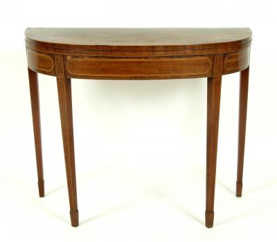 Appraisal: A GEORGE III MAHOGANY CARD TABLE of demi lune form