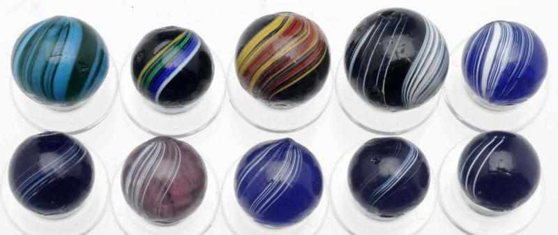 Appraisal: Lot of Handmade Marbles Includes six banded transparent marbles two