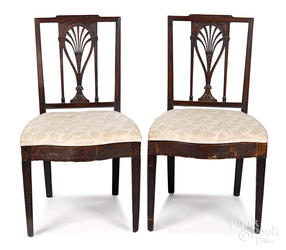 Appraisal: Pair of carved mahogany racquetback dining chairs Pair of Philadelphia