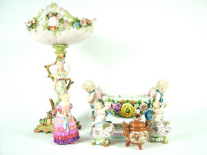 Appraisal: Continental porcelain figural centrepiece the bowl with flower encrusted decoration