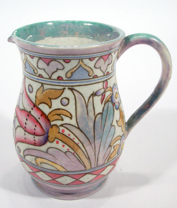 Appraisal: Charlotte Rhead Bursleyware pottery jug with tubelined and hand painted