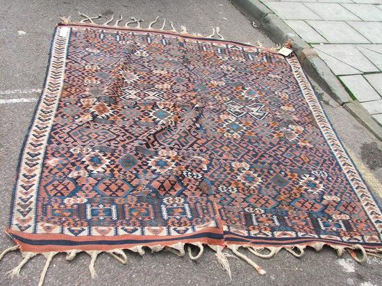 Appraisal: A TURKISH KELIM with red and blue continuing geometric decoration