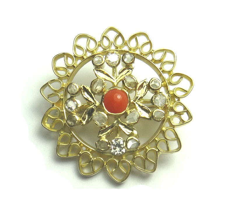 Appraisal: An ct gold diamond and coral set brooch in a