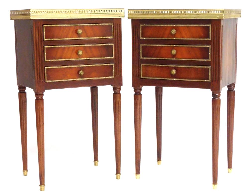 Appraisal: Pair of Louis XVI style mahogany three drawer stands white