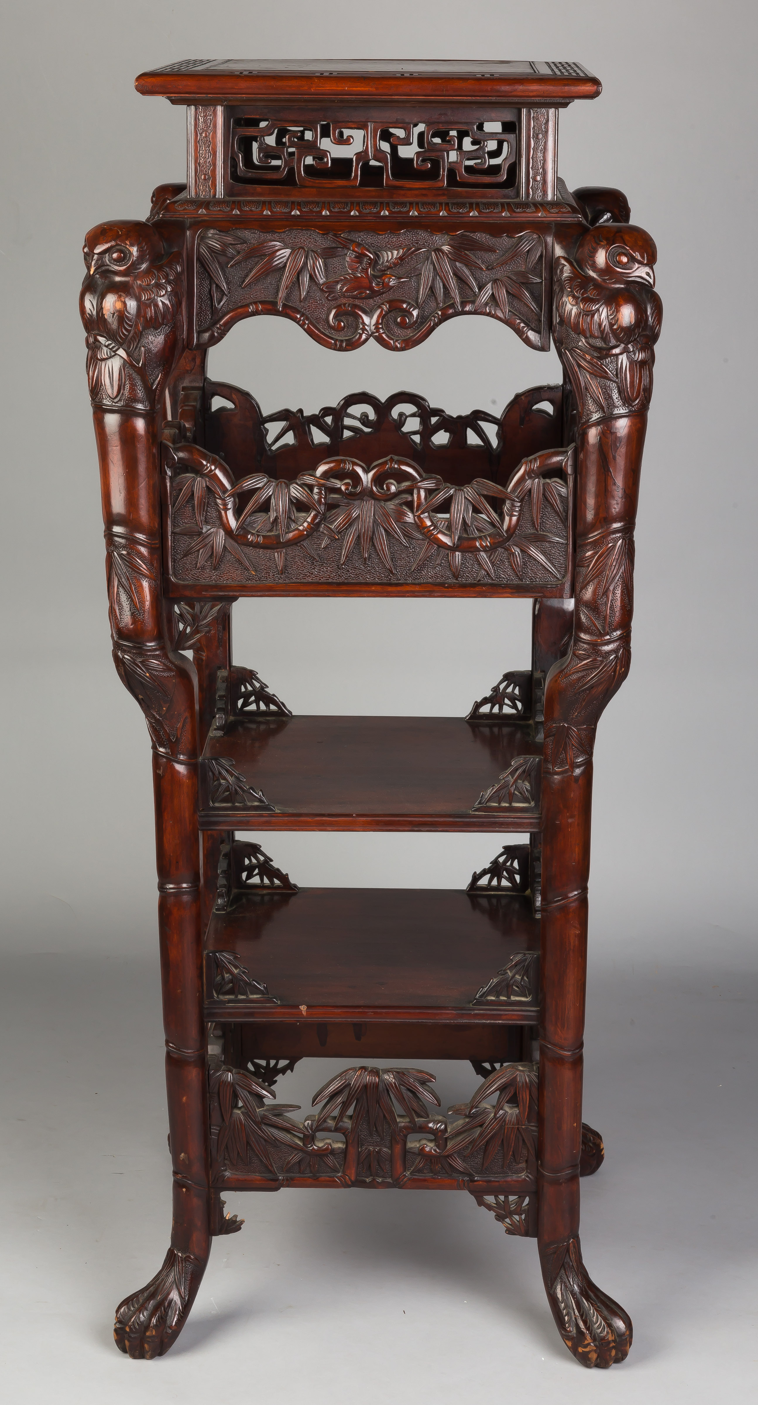 Appraisal: Chinese Carved Tiered Stand Late th century Claw feet carved