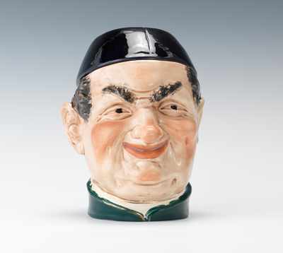 Appraisal: A Large Majolica Man's Head with Black Cap Tobacco Humidor