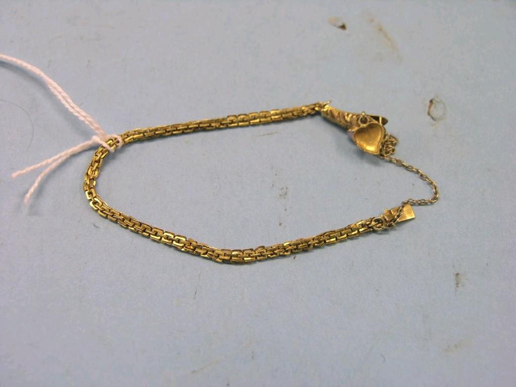 Appraisal: A yellow metal pendant on chain serpent pendant set with