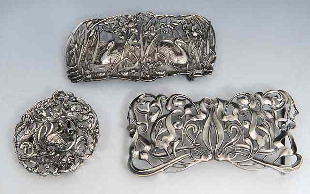 Appraisal: Three Art Nouveau style pewter buckles one in the form