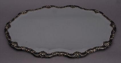 Appraisal: CONTINENTAL ROCOCO-STYLE SILVER-PLATED AND MIRROR GLASS PLATEAU Of oblong scalloped