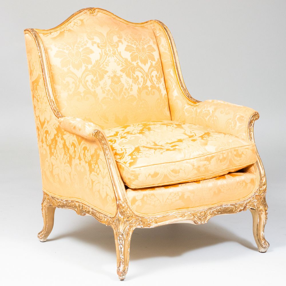 Appraisal: Louis XV Style Giltwood Berg re L'Oreilles Upholstered in silk