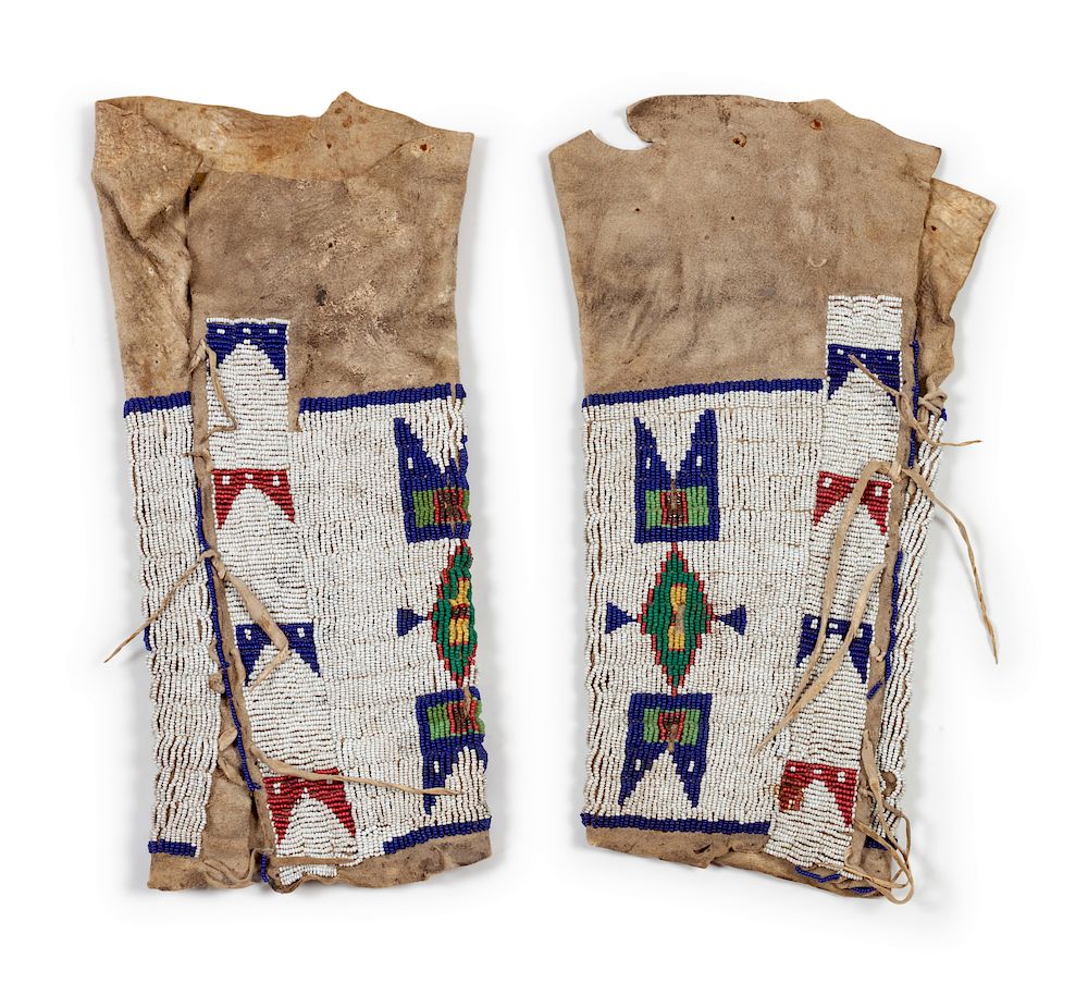 Appraisal: Sioux Child's Beaded Hide Leggings each length x width inches