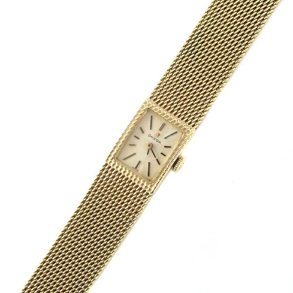 Appraisal: A lady's k gold mesh bracelet wristwatch dial signed Omega