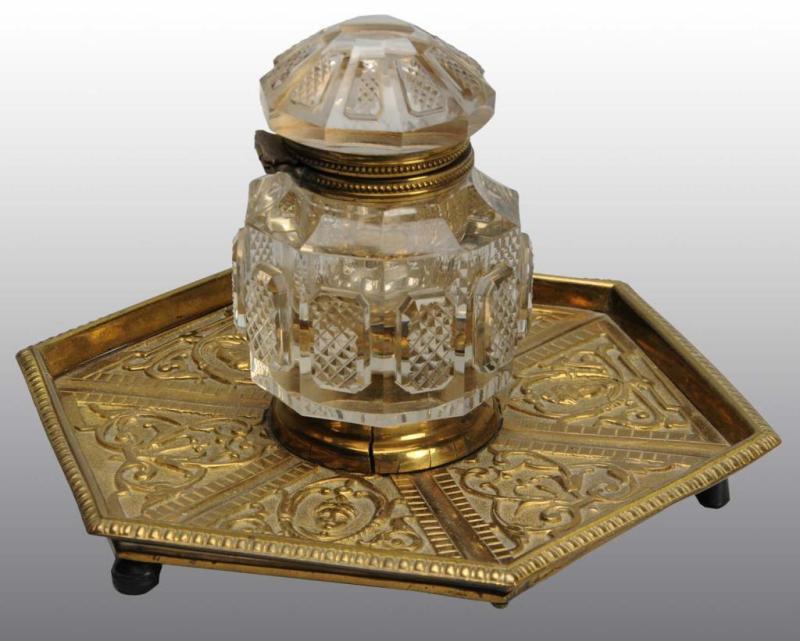 Appraisal: Cut Glass Inkwell on Brass Base Description Circa Inkwell has