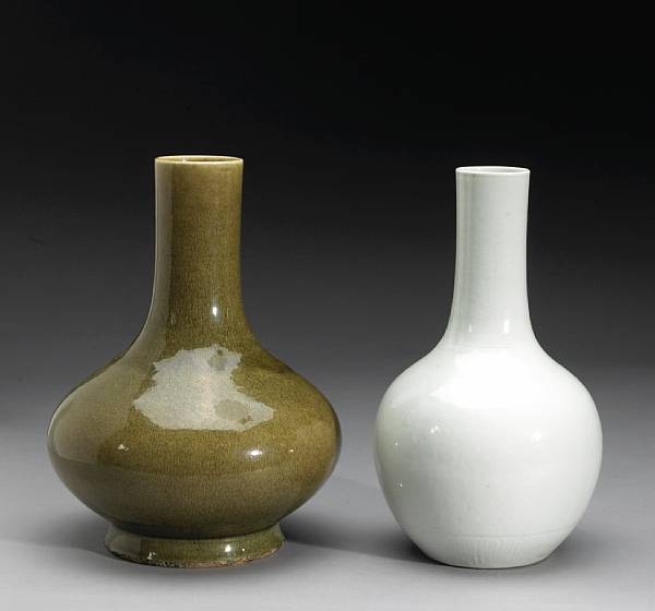 Appraisal: Two glazed porcelain stick neck vases th th Century The