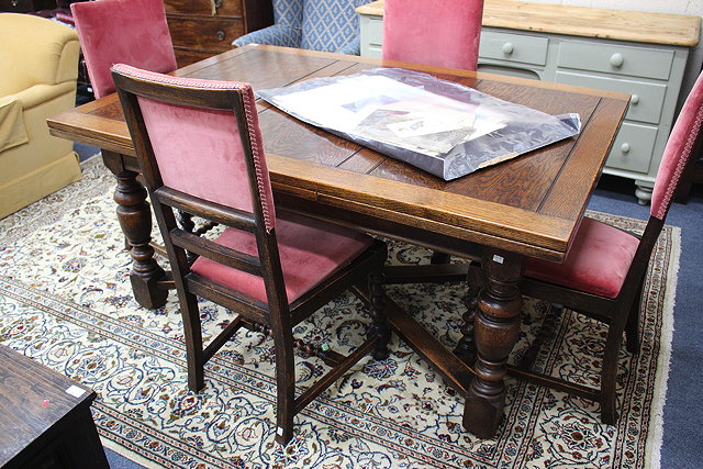 Appraisal: AN OAK DRAW LEAF DINING TABLE with turned legs united