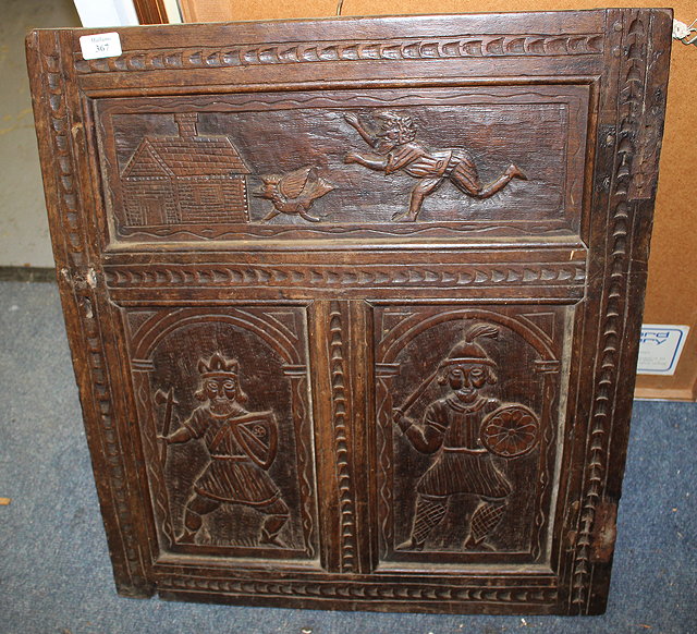 Appraisal: AN ANTIQUE CARVED OAK PANEL originally a cupboard door with