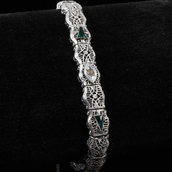 Appraisal: Edwardian Art Deco Filigree Bracelet with Emerald Clear paste Jewels