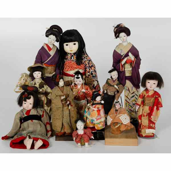 Appraisal: Japanese Character Dolls Japanese a group of twelve Japanese character